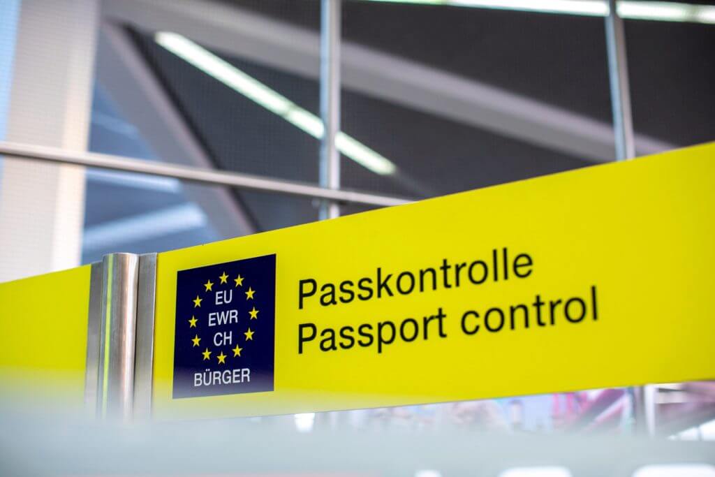 picture shows a passport controll sign in a EU country